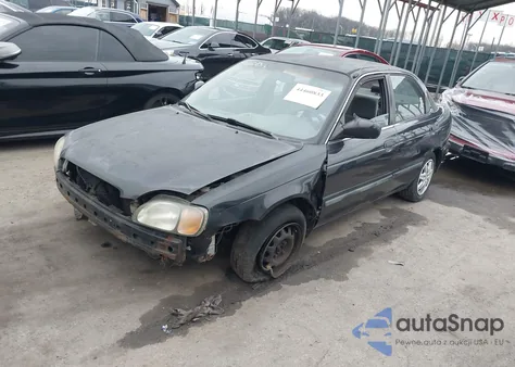 2002 Suzuki Esteem Gl/Glx z USA, uszkodzony, nr VIN JS2GB41S525403158